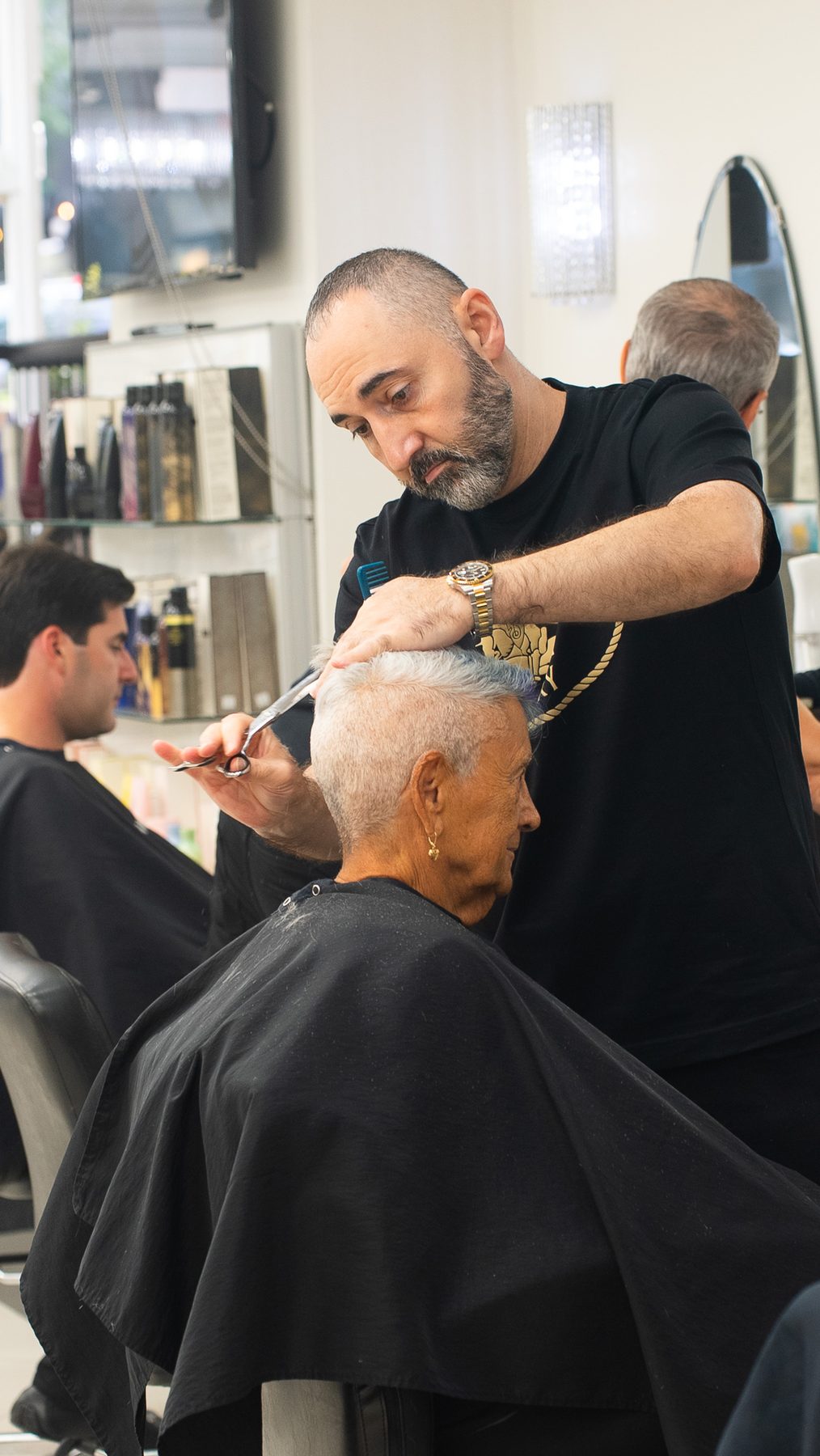 Precision haircut in progress at Salon Icon NYC